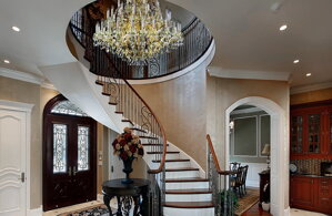 Modern crystal chandelier above the stairs