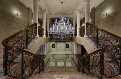 Crystal chandelier above the staircase in chateau style L137CLN