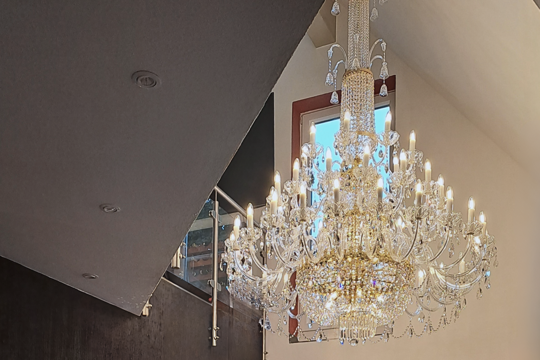 Loft Interior Elevated by Crystal Chandelier